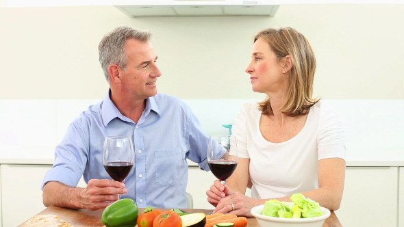 Mature Couple Drinking Red Wine Together 1 Mature Couple Drinking Red Wine Together 1