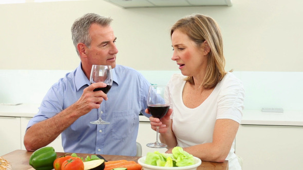 Mature Couple Drinking Red Wine Together 2 Mature Couple Drinking Red Wine Together 2