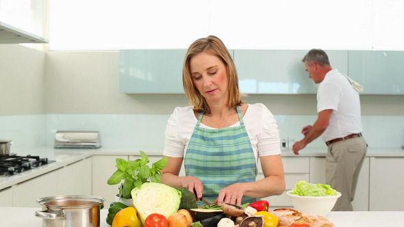 Mature Couple Making Dinner Together Mature Couple Making Dinner Together