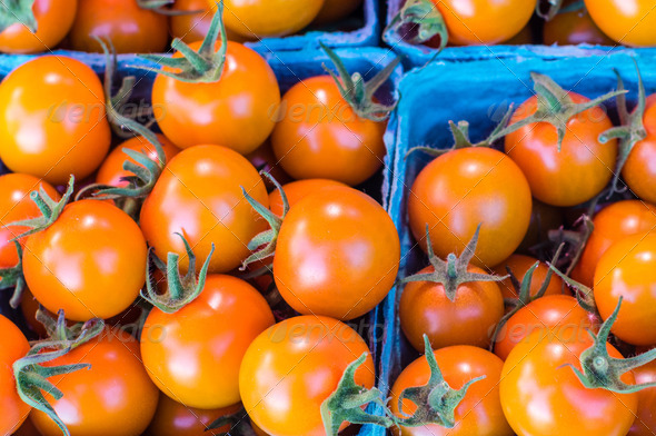 Orange cherry tomatoes at the market (Misc) Photo Download