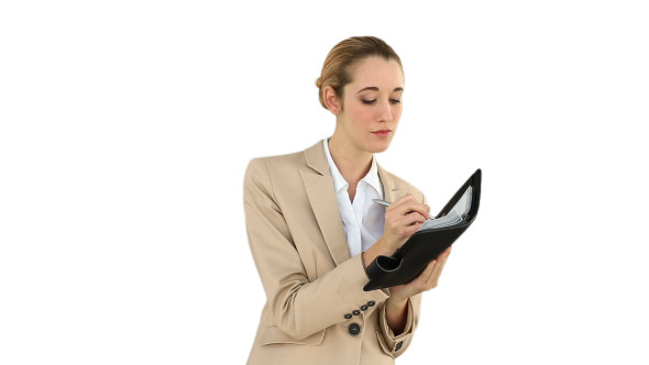 Businesswoman Writing In Her Diary Businesswoman Writing In Her Diary