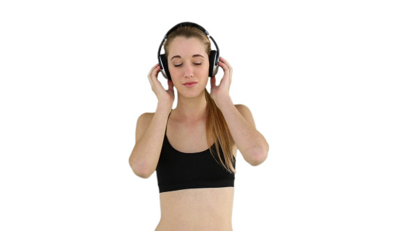 Fit Model Listening To Music And Smiling Fit Model Listening To Music And Smiling