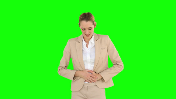 Businesswoman Rubbing Her Sore Stomach 1 Businesswoman Rubbing Her Sore Stomach 1