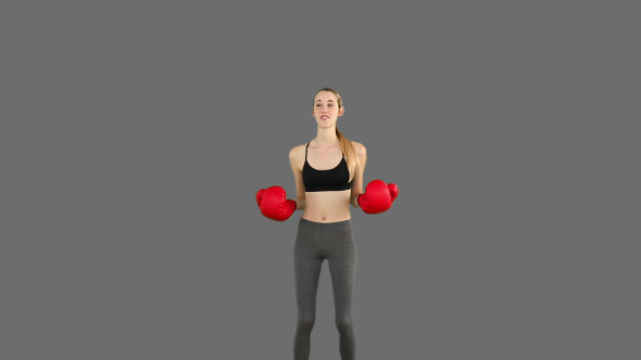 Fit Model Cheering With Red Boxing Gloves 5 Fit Model Cheering With Red Boxing Gloves 5