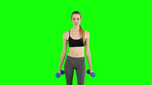 Fit Model Raising Hand Weights Fit Model Raising Hand Weights