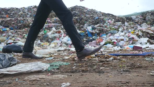 Videohive Legs Walking At Mountain Garbage 19069656